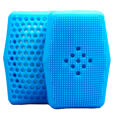 2 Sud Stud V2s showing both soap saving honeycomb pattern and exfoliating bristle side.